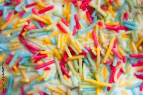Blurred colorful background and wallpaper from a sweet pastry topping for baking.