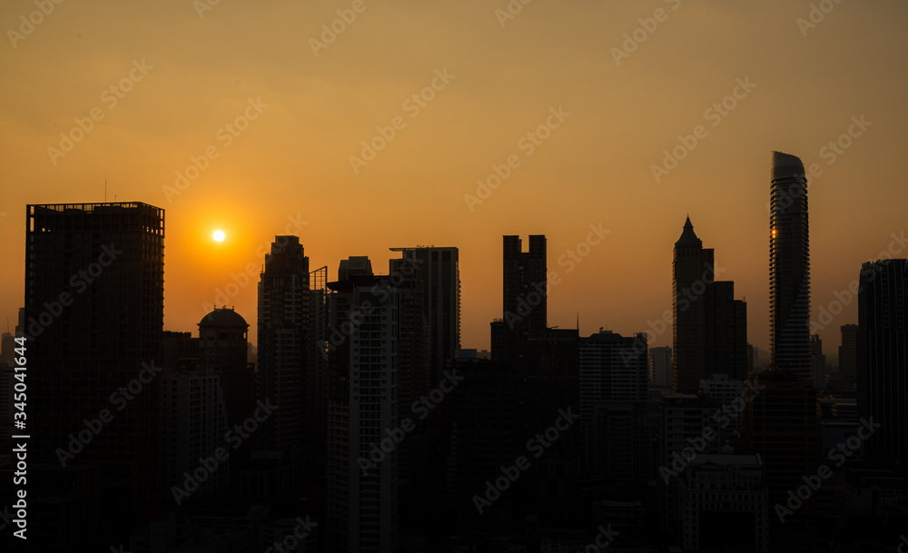 City silhouette against the sky on a sunset. Bangkok city.
