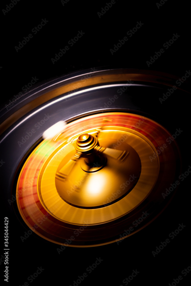 Spinning Roulette table close up at the Casino - Selective Focus Spinning Roulette table close up at the Casino - Selective Focus