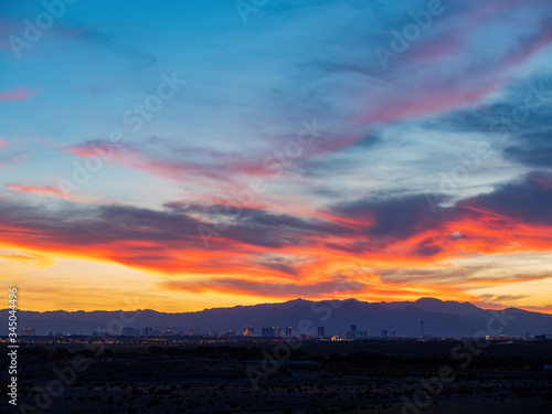 Sunset view of the beautiful strip skyline with red clouds