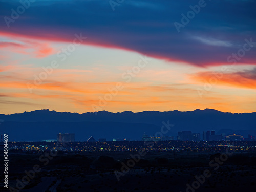 Sunset view of the beautiful strip skyline with red clouds