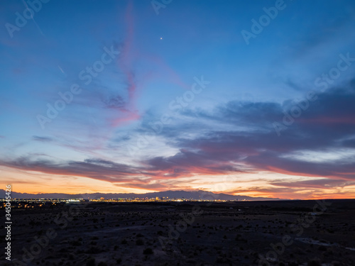 Sunset view of the beautiful strip skyline with red clouds