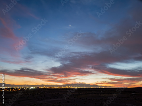 Sunset view of the beautiful strip skyline with red clouds