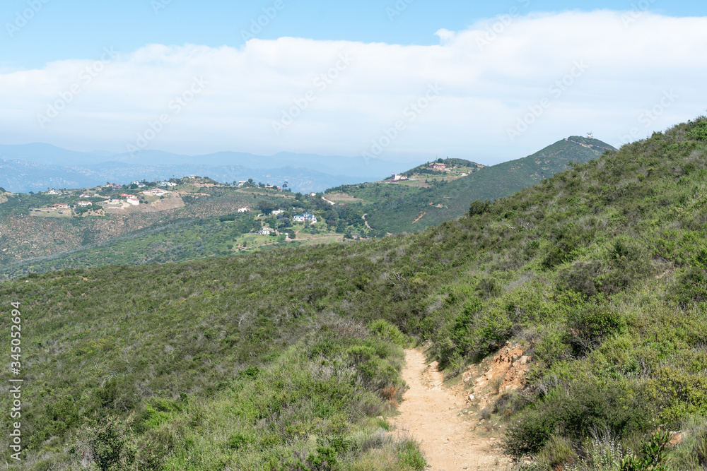 Small trail in Double Peak Park in San Marcos. 200 acre park featuring a play area and hiking trails that lead to a summit.