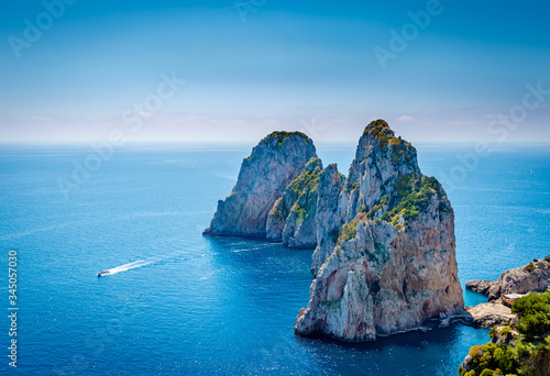 View of famous Faraglioni Rocks in  Capri island, Italy. photo