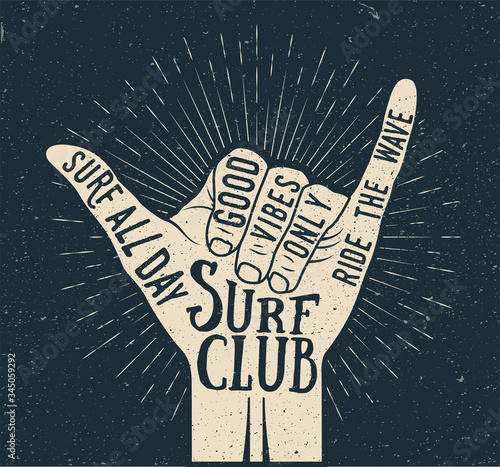 Surf shaka hand gesture silhouette on dark background. Summer time surfing themed vintage styled vector illustration photo