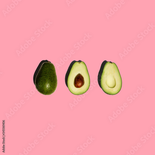Avocado isolated on pink background. Fresh. Vegetables. Food photo.