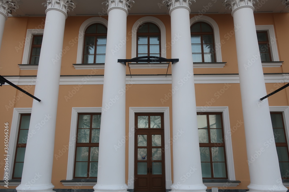 Obraz premium large dark windows of a light building
