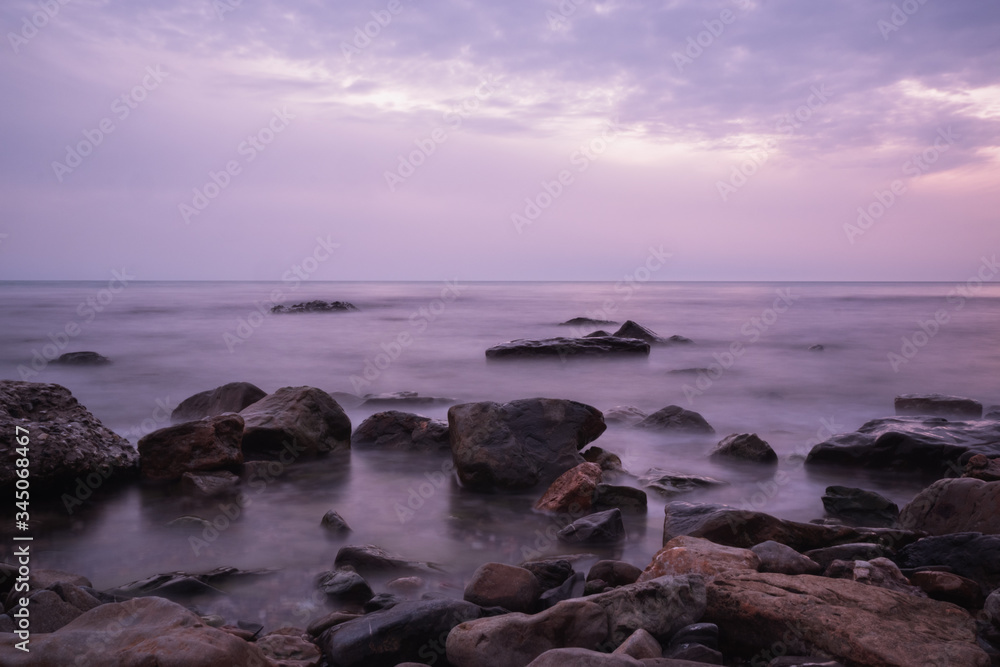 beautiful purple sunset on the sea coast beautiful purple sunset on the sea coast