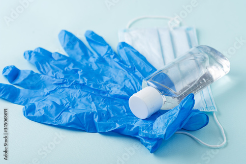 Wallpaper Mural protective equipment, health care, medical mask, sanitizer and medical mask on blue background Torontodigital.ca