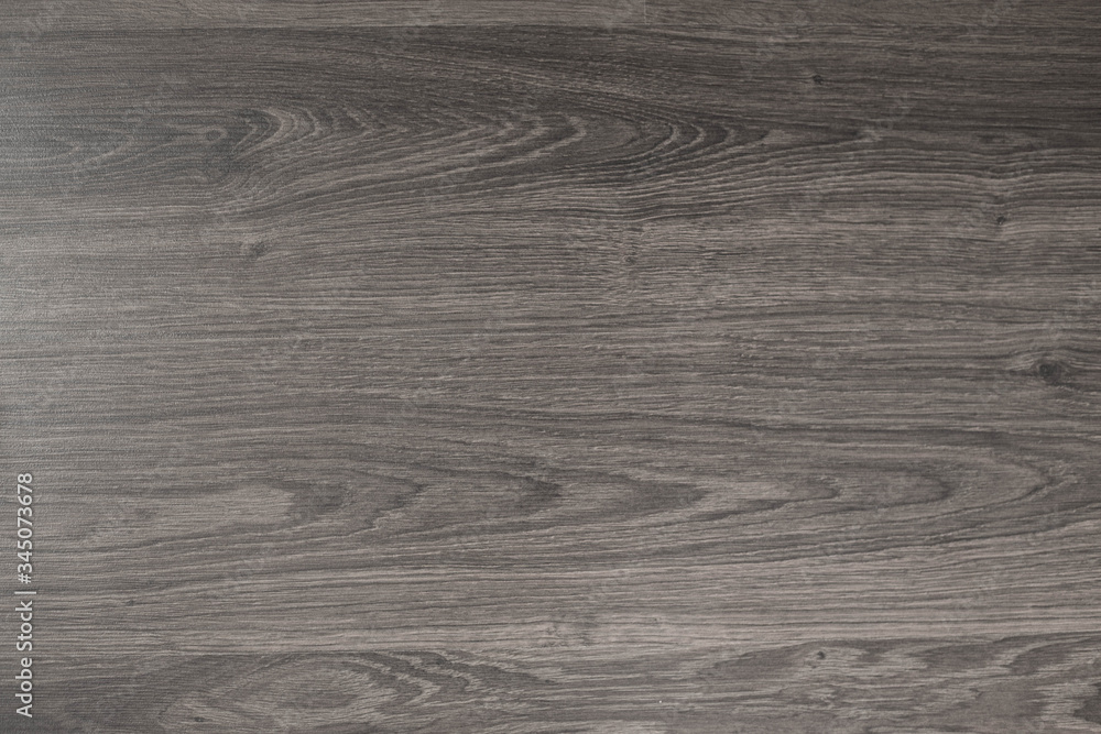 Obraz premium Wooden brown textured floor or desk background and texture of Walnut wood decorative furniture surface