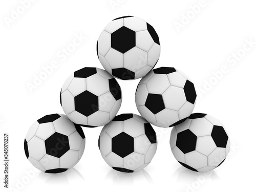 Black and white soccer ball pyramid on a white background