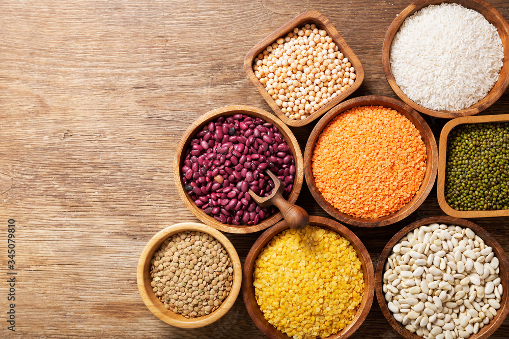 bowls of legumes, lentils, chickpeas, rice and beans, top view bowls of legumes, lentils, chickpeas, rice and beans, top view