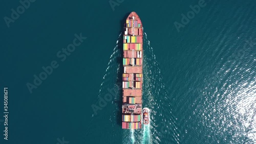 Aerial view of Cargo ship. Large container ship at sea - Aerial top down. 
