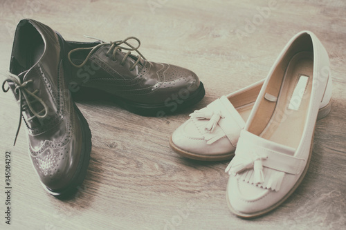 Oxfords shoes retro style stand on the wooden floor.