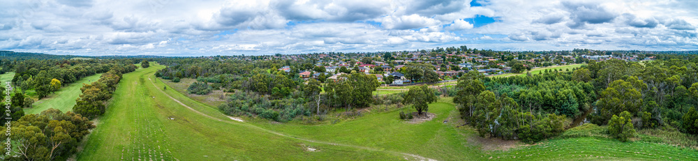 Rowville reserve and residential area in Melbourne, Australia - wide aerial panorama