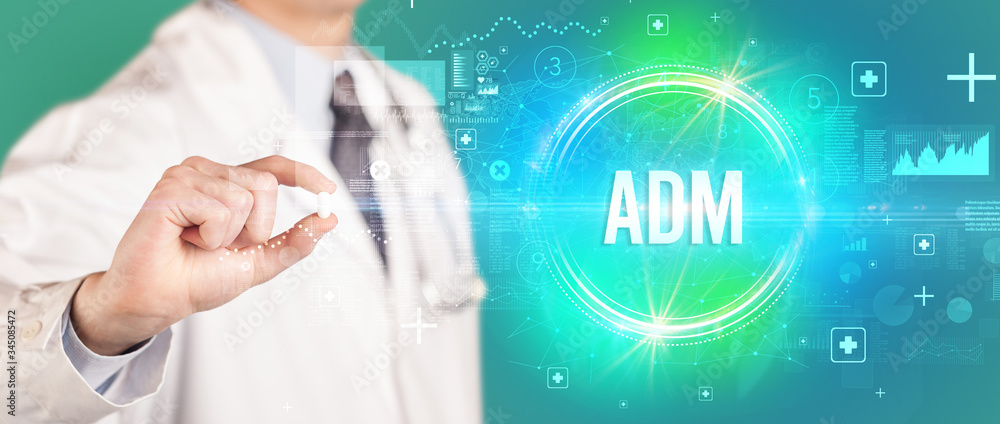 Close-up of a doctor giving you a pill with adm abbreviation, virology concept Close-up of a doctor giving you a pill with adm abbreviation, virology concept