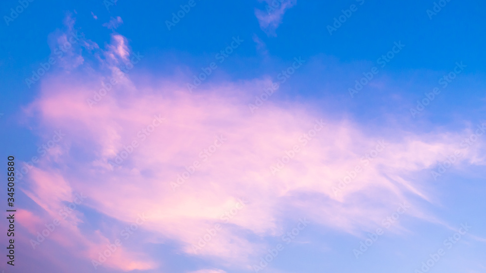 Abstract sky, colourful clouds before strom in blue sky background. Puffy and brilliant white clouds before sunset. Sky and clouds background