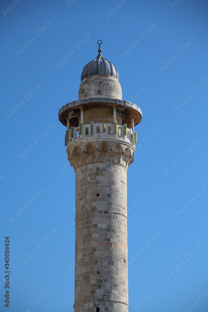 A Mosque tower with blue sky, Israel