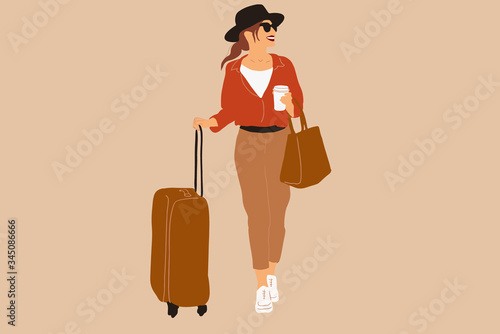 Woman with a traveling suitcase on the background