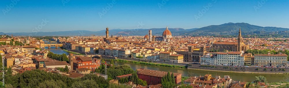 Fascinating panoramic view of the city of Florence at summer's noon. Travel destination Tuscany, Italy