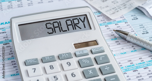 A calculator with the word Salary on the display