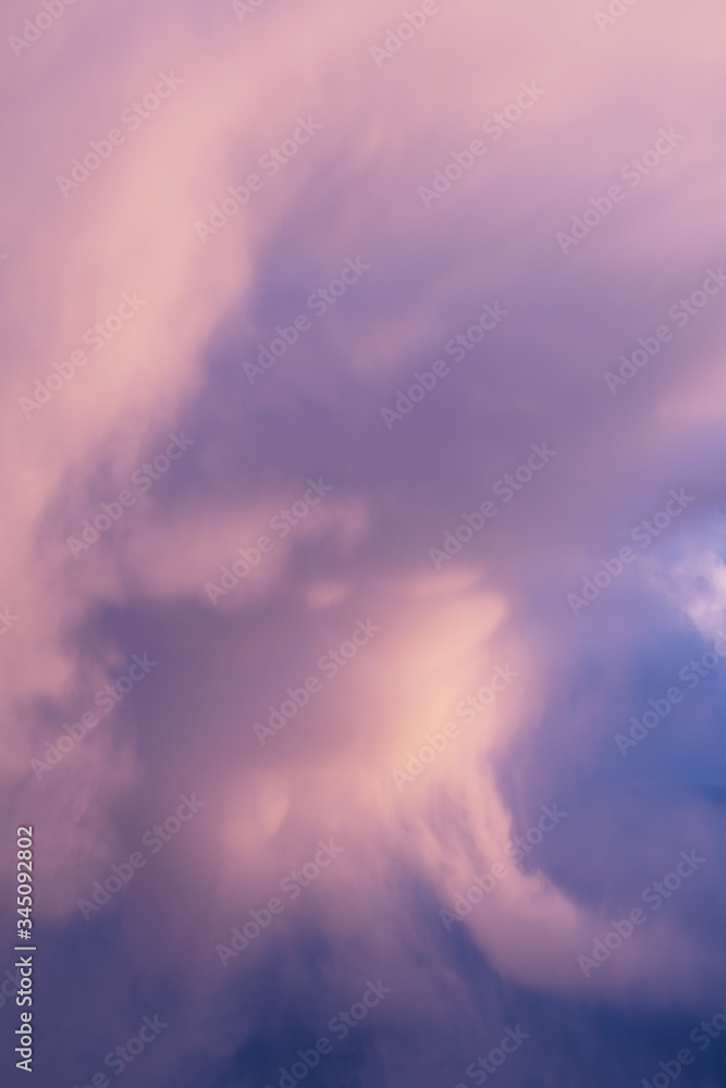 Huge pink/purple dramatic clouds, background