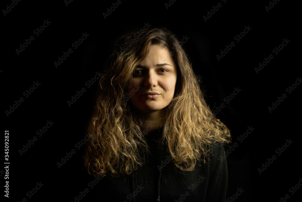 a beautiful girl portrait on black background a beautiful girl portrait on black background