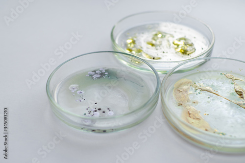Viruses and bacteria in a Petri dish, various analyses in the laboratory.