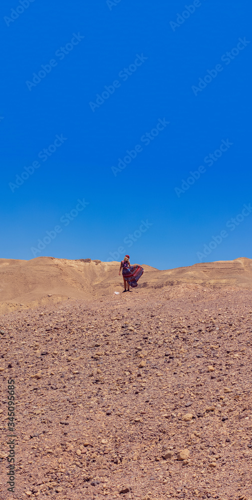 woman single person in desert drying nature scenery environment vertical format