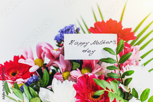 Happy mother's day in a beautiful bouquet of flowers 