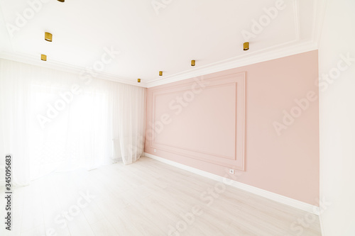 Interior photos for designers and employees. Room with LED lighting and pink wall. Bright room for family, housing and recreation