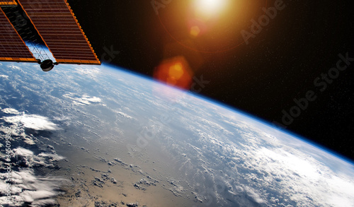 Fototapeta Naklejka Na Ścianę i Meble -  View of planet Earth from a space station window during a sunrise 3D rendering elements of this image furnished by NASA
