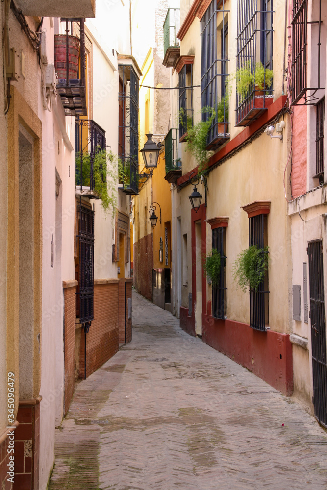 Empty narrow street in the morning, Lisbon, Portugal