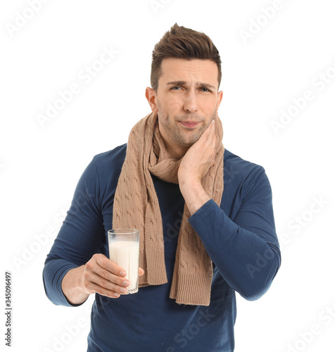 Young man ill with flu hold...