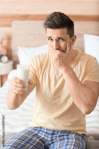 Young man with milk allergy...