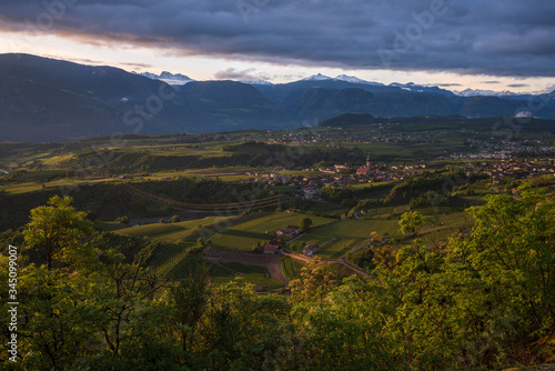 View of Bolzano and the surrounding villages of the high mountain hiking trail in Appiano in Italian South Tyrol.