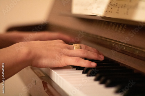 Hand on piano