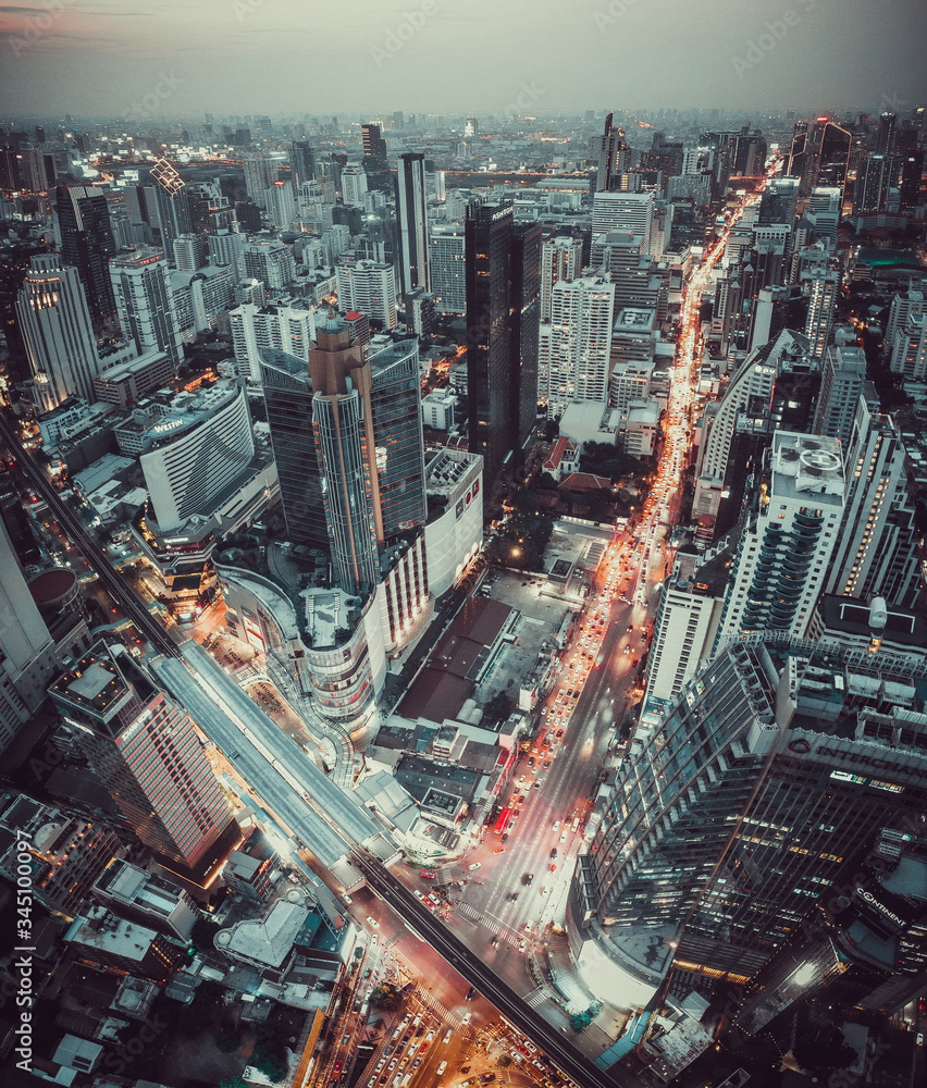 Fototapeta premium Aerial view of Asoke intersection and sky train station in Bangkok Thailand