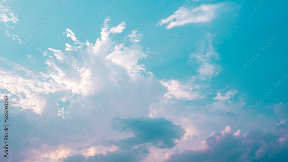 Fototapeta premium Beautiful clouds in blue sky background. Puffy and brilliant white clouds before sunset. Sky and clouds background