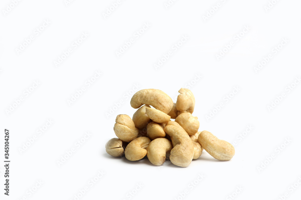 A pile of cashew isolated on white background. Image contains copy space A pile of cashew isolated on white background. Image contains copy space