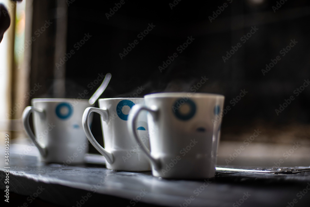 Smoking coffee cups on Indian kitchen. Indian lifestyle Smoking coffee cups on Indian kitchen. Indian lifestyle
