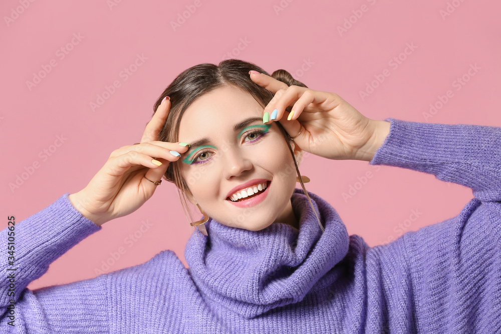 Young woman with beautiful manicure on color background Young woman with beautiful manicure on color background