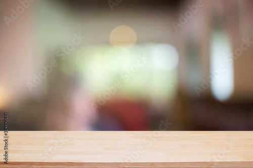 Desk space and blurred of restaurant background. for product display montage. business presentation.