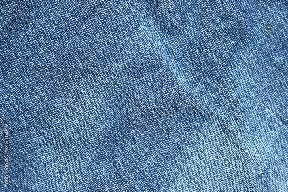 Abstract fabric texture of blue jeans or denim background. Abstract fabric texture of blue jeans or denim background.
