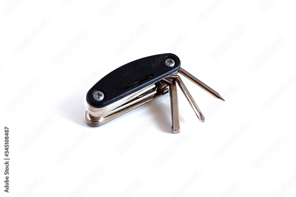 folding screwdriver on a white background. Tools folding screwdriver on a white background. Tools