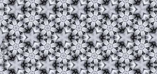 Computer generated image of a mesh of textured raised leaves and flowers  which mimics the aesthetics of pencil drawing in grey, black and white tones. Monochrome background