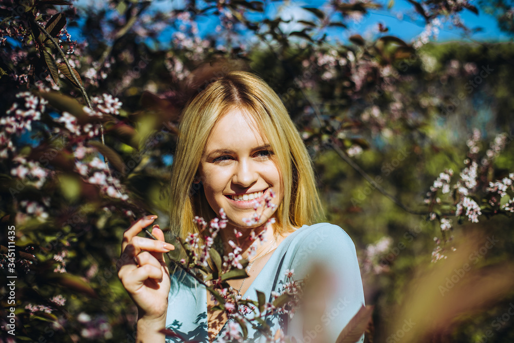 Beautiful spring girl in blooming tree Beautiful spring girl in blooming tree