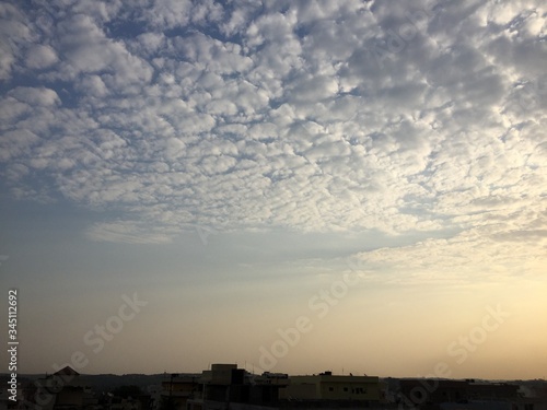 A BEAUTIFUL EVENING SKY WITH BRIGHT AND CHARMING CLOUDS IN THE SKY