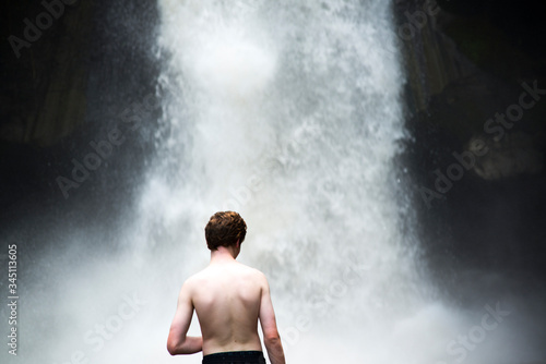 Boy on a waterfall